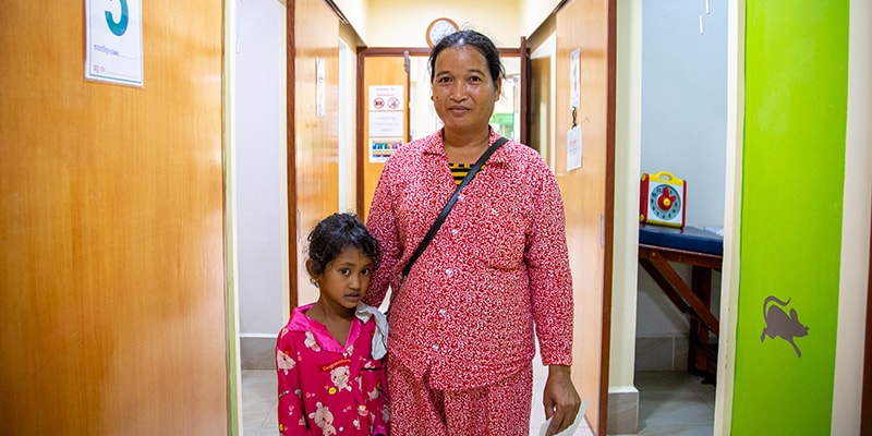 Champey and Arun Wait for Treatment at the AHC OPD