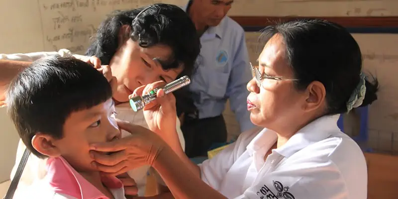 Doctor Checking Child Eyes