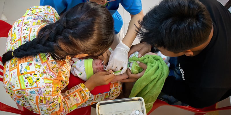 Doctor Curing The Cleft Baby